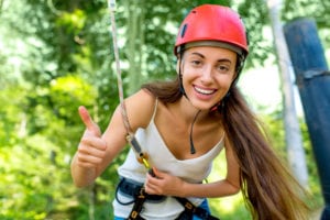 happy girl on zipline tour