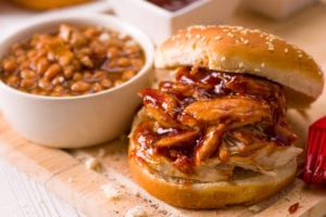 BBQ sandwich with side of baked beans